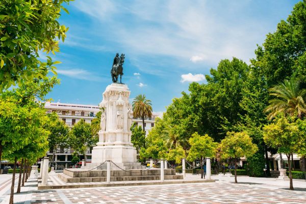 Seville, Spain. Monument to King Saint Ferdinand at New Square Plaza Nueva) in Seville, Spain.